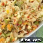 Crisp & Zesty Sauerkraut Slaw 9 Pinterest image with text "Sauerkraut Salad"