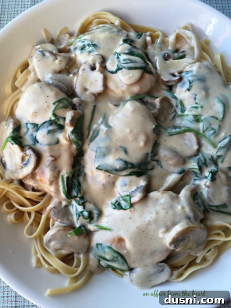 Creamy Chicken and Mushroom Florentine Pasta 19 A plated dish of Chicken and Mushroom Florentine Pasta, ready to be enjoyed.