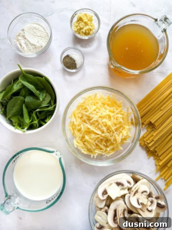 Creamy Chicken and Mushroom Florentine Pasta 7 A bottle of olive oil next to a bowl of flour.