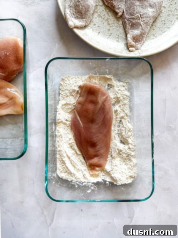 Creamy Chicken and Mushroom Florentine Pasta 9 Fettuccine pasta boiling in a pot of water.