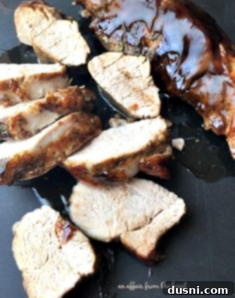 Sweet Balsamic Glazed Pork Tenderloin, close-up shot of the cooked tenderloin before slicing.