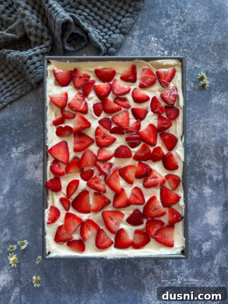 Building the layers of strawberry icebox cake