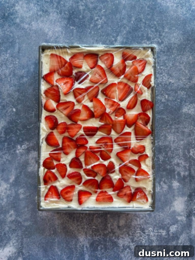 Covered Strawberry Icebox Cake ready for chilling