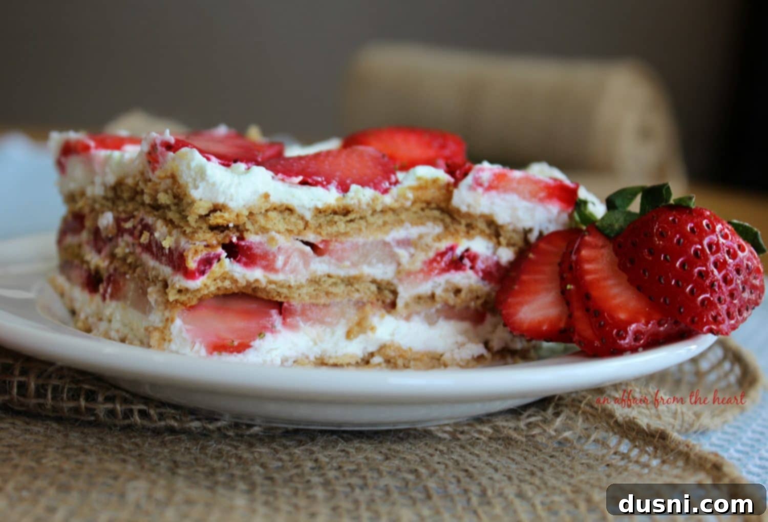 Close up of Old Fashioned Strawberry Icebox Cake on a white plate