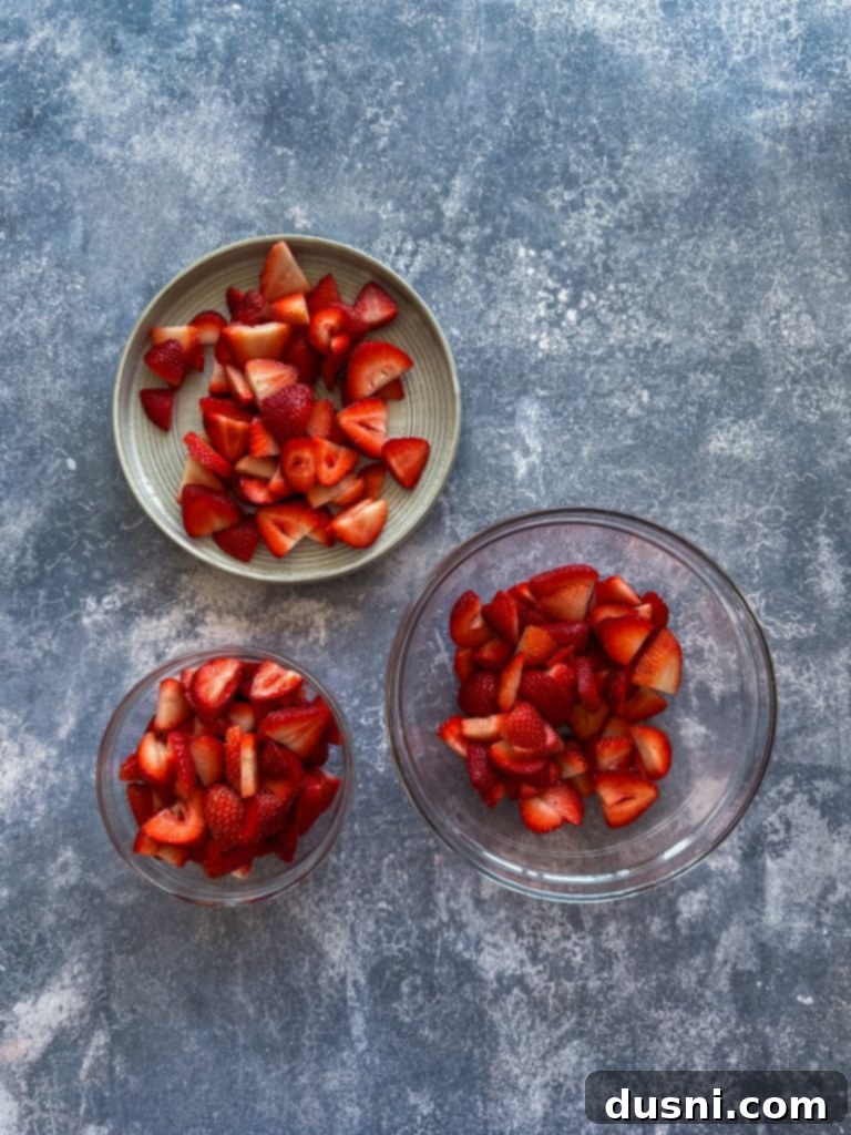 Freshly sliced strawberries in a bowl