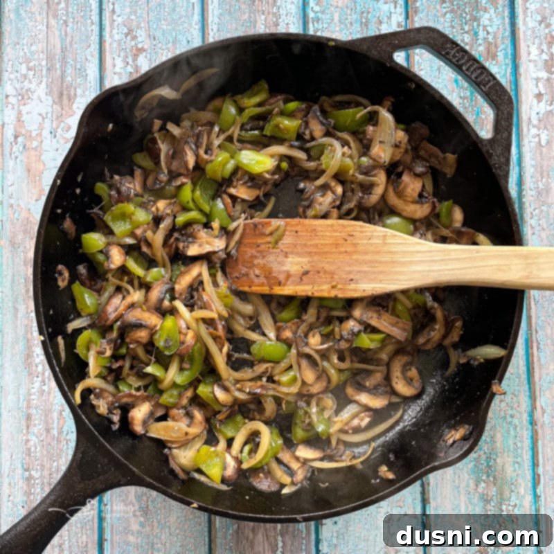 Loaded Philly Cheese Steak Peppers 11 sauteeing the mushrooms and peppers