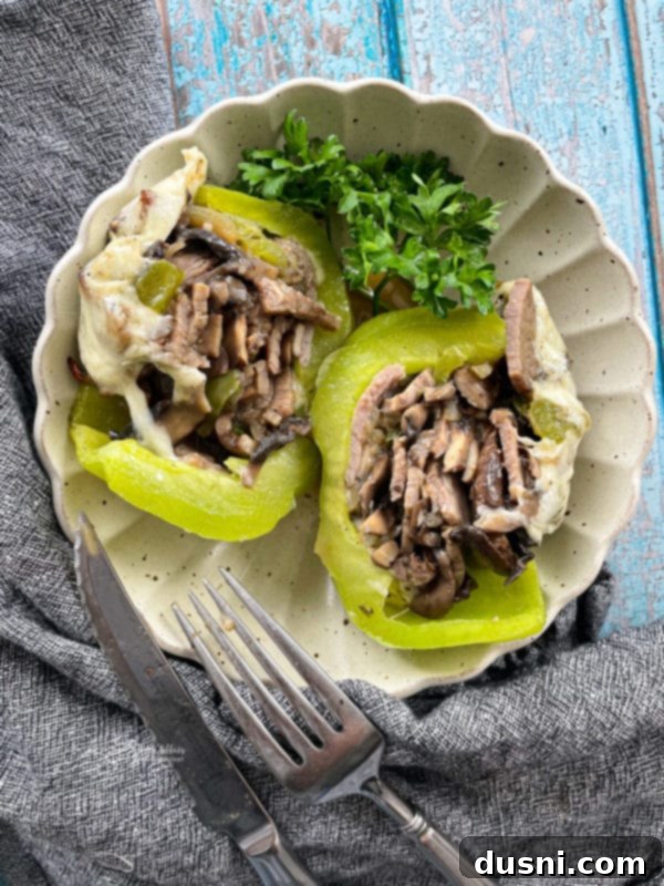 Loaded Philly Cheese Steak Peppers 17 serving dish of philly cheesesteak stuffed peppers