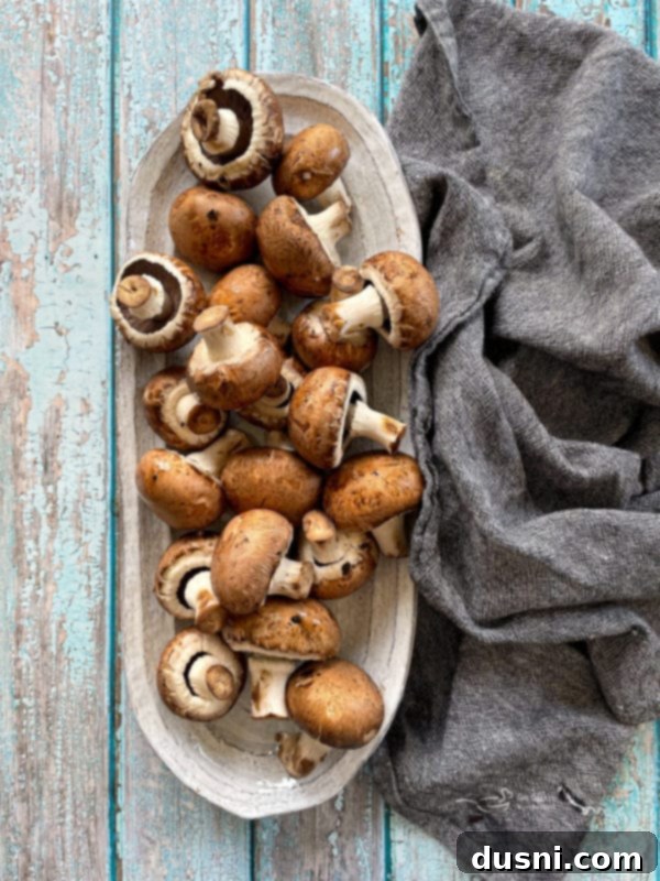 Loaded Philly Cheese Steak Peppers 5 overhead of Mushrooms on a plate