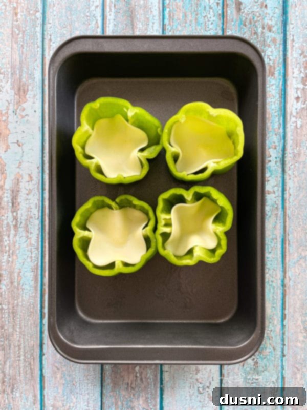 Loaded Philly Cheese Steak Peppers 9 Peppers with cheese in them in a baking dish