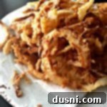 Crispy Golden Onion Strings 8 close up of Homemade Onion Strings