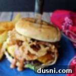 Frontier Burger 7 Western Burger and fries on a blue plate