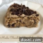 Chilled Mocha Chocolate Chip Delight 16 side view of a slice of cake on a white plate with text "Mocha Chocolate Chip Icebox Cake"