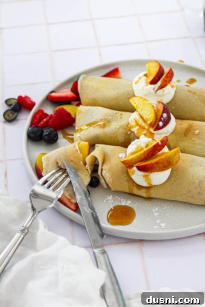 Golden Crepes Topped with Summer Fruits 2 Sweet Crepes with Summer Fruits and Whipped Cream