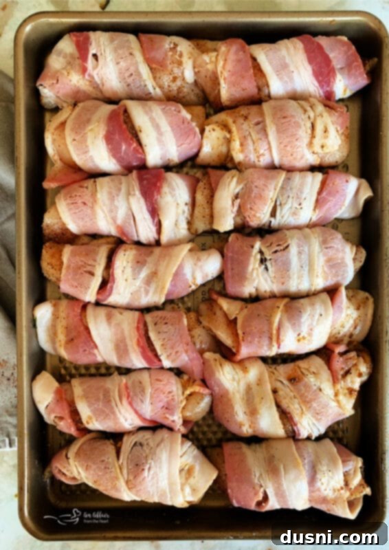Sweet Heat Bacon-Wrapped Chicken 7 Wrap each piece of chicken with a slice of bacon and roll in brown sugar
