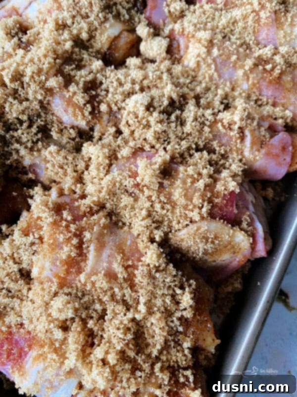 Sweet Heat Bacon-Wrapped Chicken 8 Chicken pieces generously sprinkled with brown sugar before baking