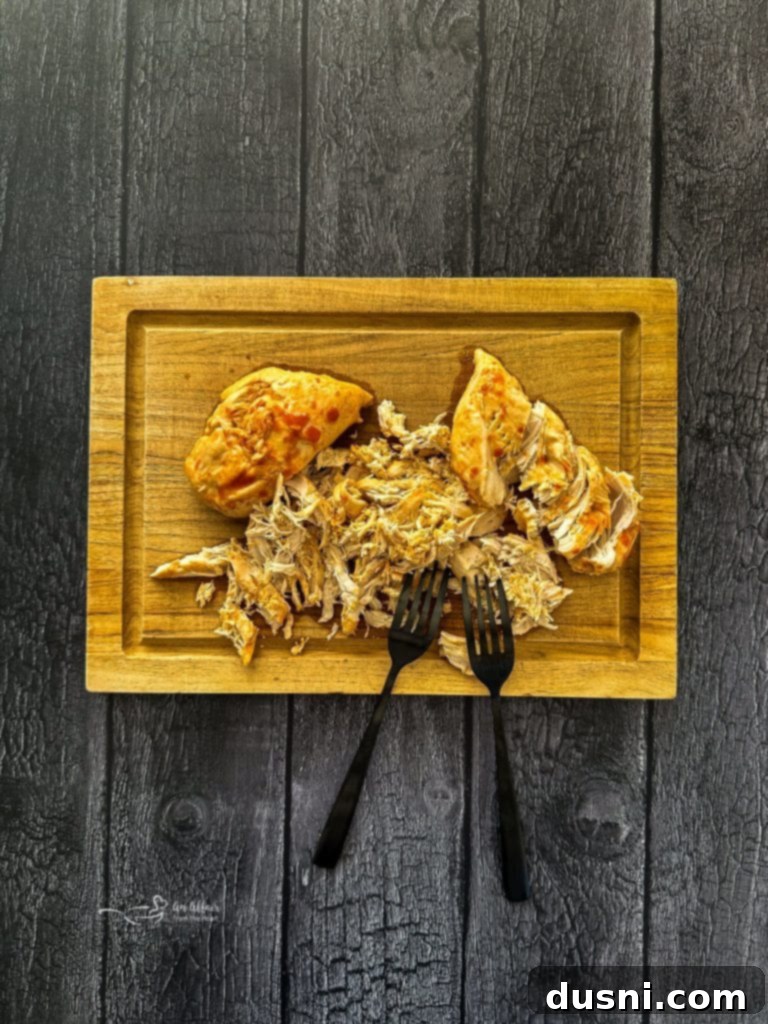 Spicy Buffalo Chicken Lettuce Cups 8 Shredding cooked buffalo chicken