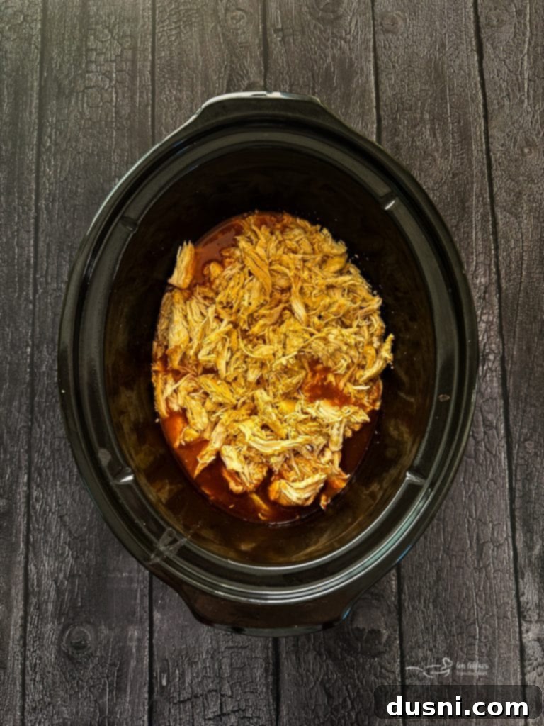 Spicy Buffalo Chicken Lettuce Cups 9 Shredded buffalo chicken in crockpot sauce