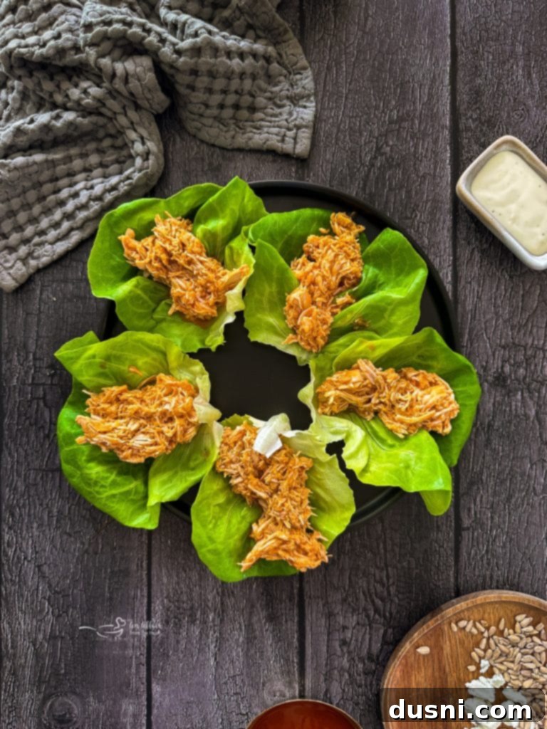 Spicy Buffalo Chicken Lettuce Cups 10 Assembling buffalo chicken lettuce wraps