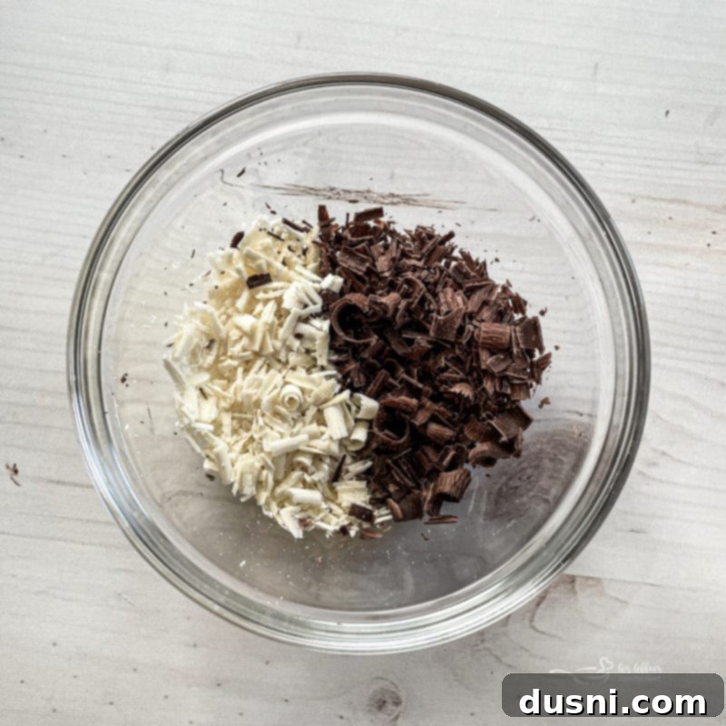 Ultimate Chocolate Pudding Dream Cake 10 A bowl of miniature chocolate chips ready to be sprinkled on the cake.