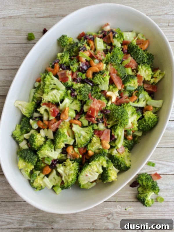 Smoky Cashew Broccoli Crunch 11 One bowl filled with bacon cashew broccoli salad, presented beautifully for serving.