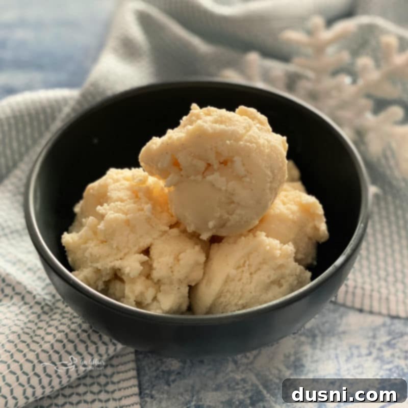 A large bowl filled with freshly mixed snow ice cream before freezing, showing its slushy texture.
