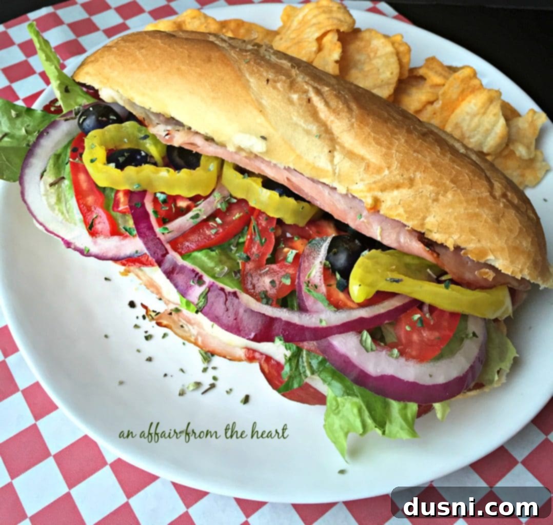 Crispy Italian Sub Melts 4 A perfectly toasted Italian Sub Sandwich on a cutting board, ready to be served