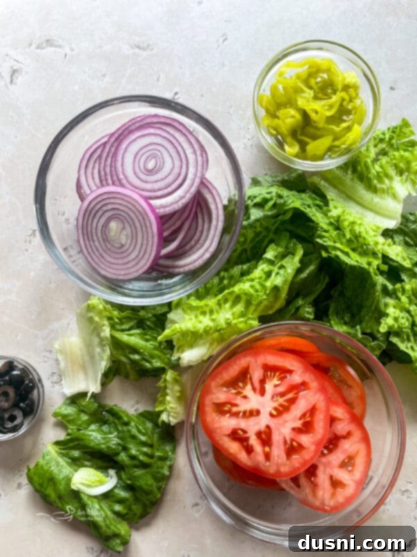 Crispy Italian Sub Melts 10 Assortment of fresh toppings for Toasted Italian Sandwiches: red onion, tomato, lettuce, pepperoncini, black olives