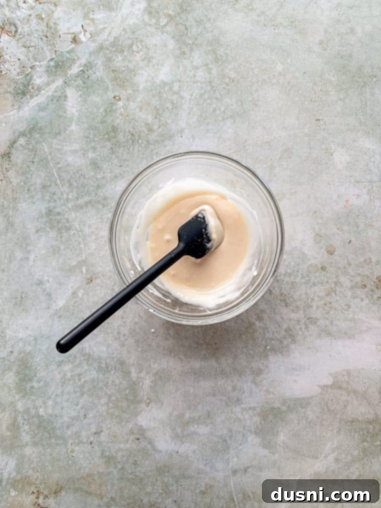 Traditional German Apple Kuchen 10 Freshly baked Apple Kuchen in a baking dish, just out of the oven.
