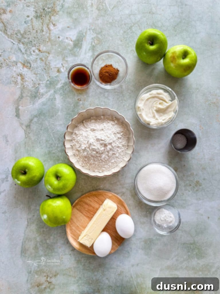 Traditional German Apple Kuchen 6 Various ingredients for Apple Kuchen laid out on a kitchen counter.