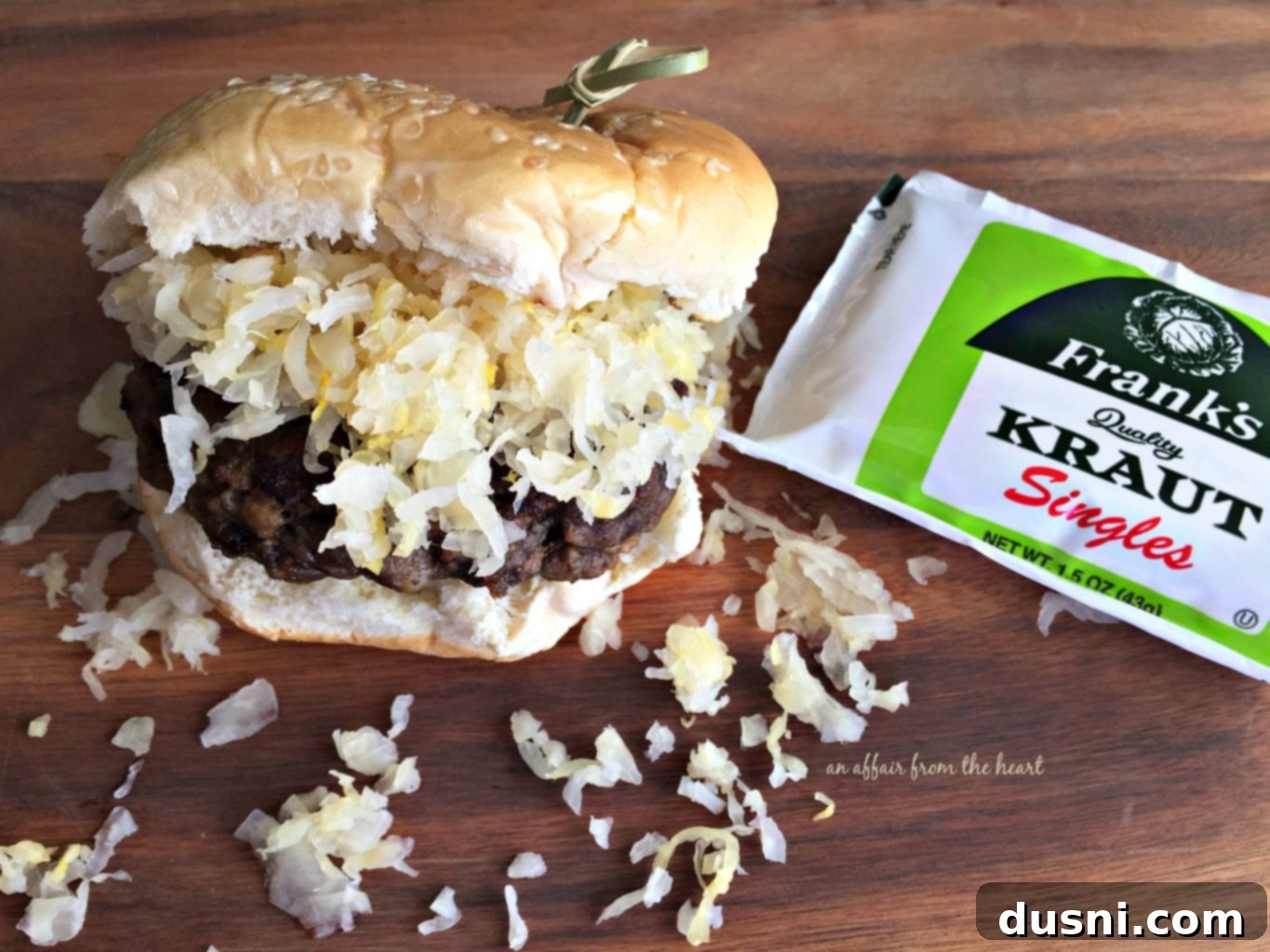 Hearty Brat Burgers 10 A delicious Brat Burger ready to eat, topped with sauerkraut