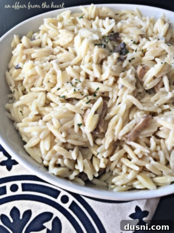 Ingredients for Creamy Mushroom Orzo on a wooden board