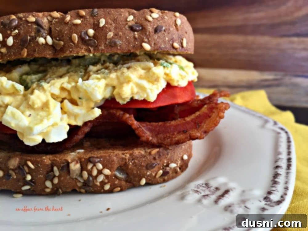 The Best Bacon, Egg Salad, and Tomato Sandwich 2 The Ultimate BEST Bacon, Egg Salad & Tomato Sandwich on toasted bread