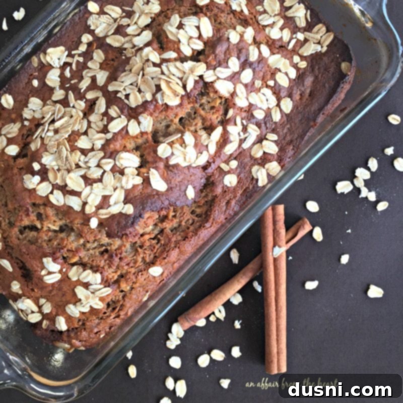 Harvest Banana Oat Loaf 2 Moist Banana Applesauce Oatmeal Bread on a cooling rack, freshly baked