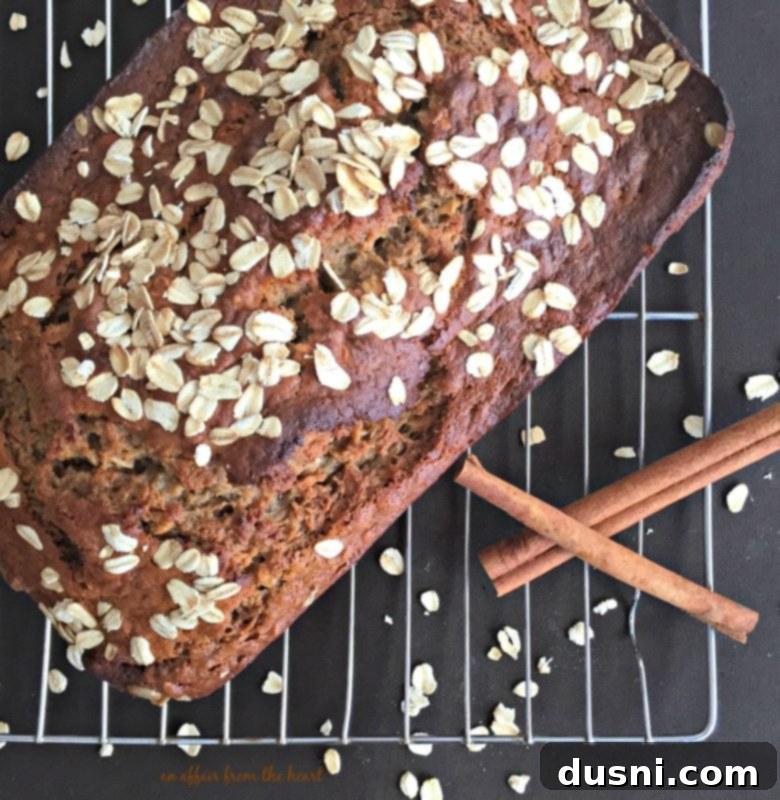 Harvest Banana Oat Loaf 6 A loaf of Banana Applesauce Oatmeal Bread sliced, showing the fluffy interior