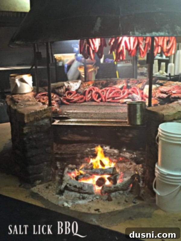 The iconic sign for Salt Lick BBQ in Driftwood, Texas, promising authentic Texas barbecue