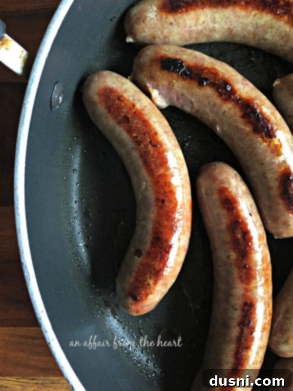 Reuben Brats: Slow-Cooked, Savory, Sensational 4 Browning bratwurst in a skillet before slow cooking