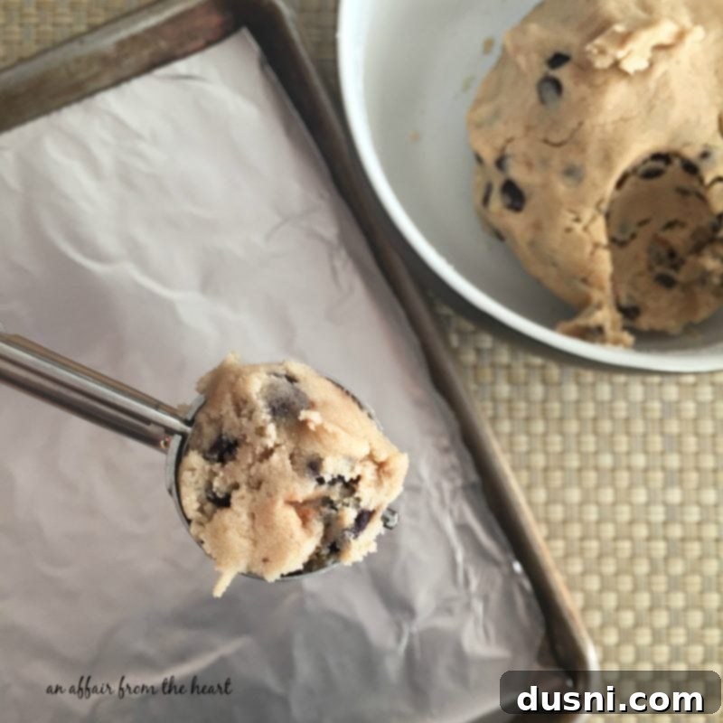Preparing chocolate chip cookie dough for truffles