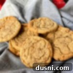 Golden Toffee Crunch Cookies 19 Close up of a plate of homemade Butter Brickle Cookies, showcasing their golden hue and toffee texture