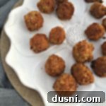 Zesty Cabbage Croquettes 8 Sauerkraut Balls on a white serving dish with text "Sauerkraut balls"