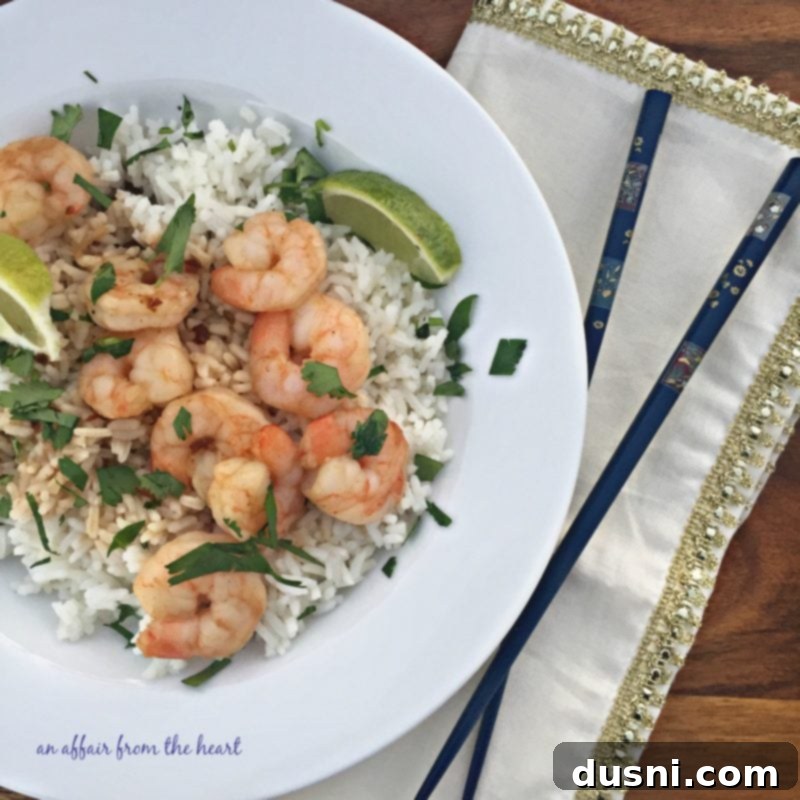 Zesty Sesame Cilantro Shrimp 2 Sesame Cilantro Shrimp served over rice with a lime wedge and fresh cilantro garnish