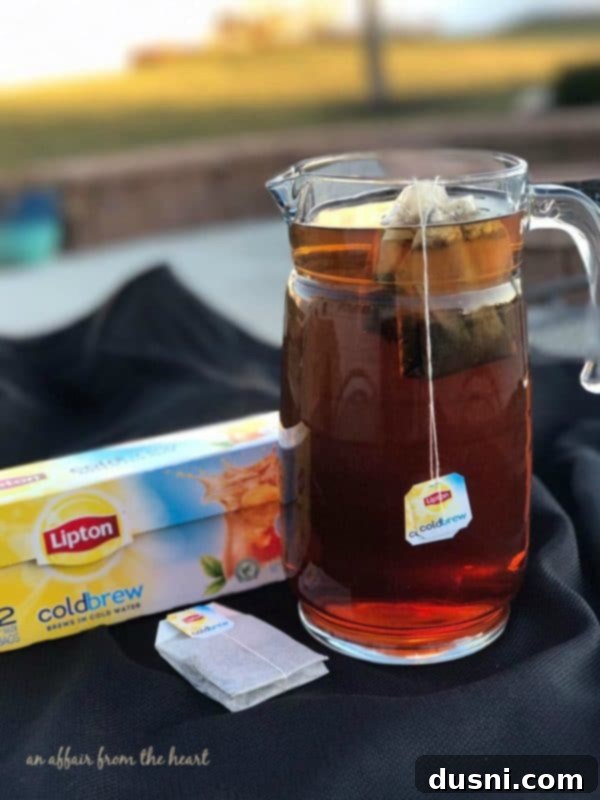 Glass of Lipton Cold Brew Iced Tea with ice and lemon