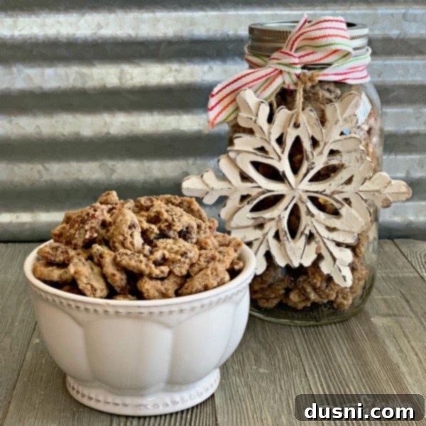 Candied Pecans 7 A mason jar filled with sugared pecans, tied with a festive ribbon, making a charming homemade gift.