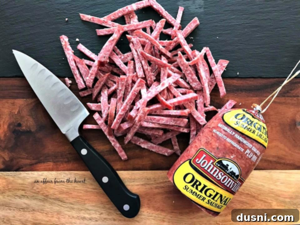 The Ultimate Summer Sausage Cheese Ball 13 Johnsonville Summer Sausage loaf, ready for slicing.