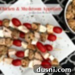 Savory Italian Chicken And Mushroom Starters 10 Italian Chicken & Mushroom Appetizer on a white plate with text of the same.