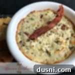 Hot Bacon and Swiss Dip 11 Dip in a white bowl with text "Hot Bacon & Swiss Dip"