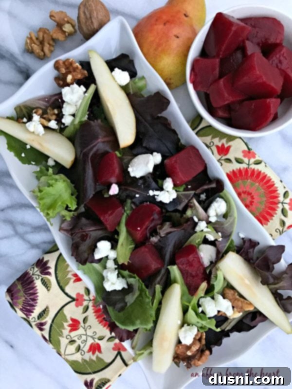 Artfully arranged Pickled Beet Salad on a white plate, highlighting vibrant colors