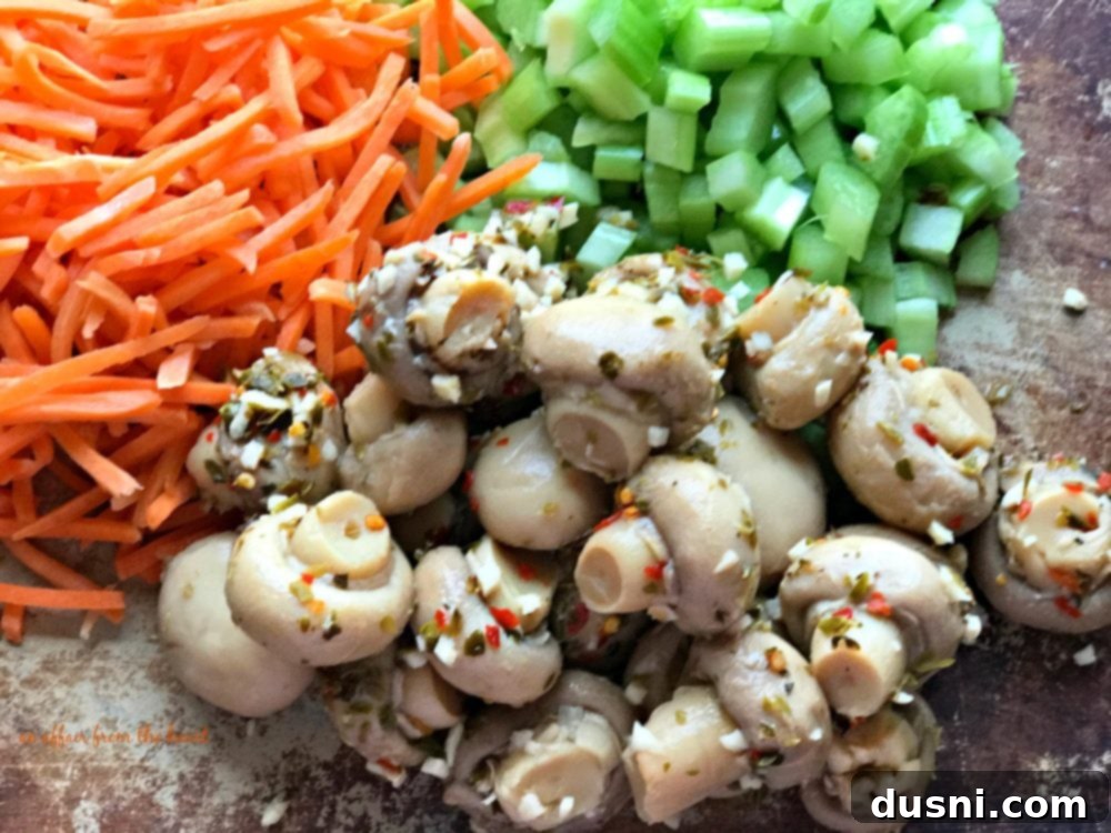 A jar of Paisley Farm Organic Marinated Mushrooms, the secret ingredient for this flavorful soup.