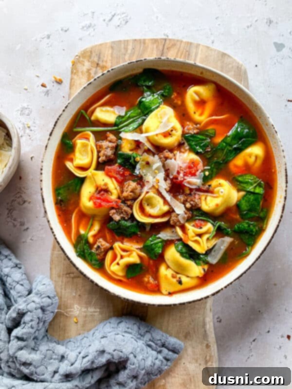 Delicious bowl of 5-ingredient tortellini soup with sausage and spinach