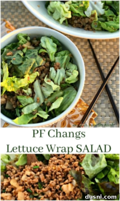 PF Changs Inspired Lettuce Wrap Salad 3 Close-up of the delicious ground chicken filling for PF Chang's Lettuce Wrap Salad, showing diced onions and fresh herbs.