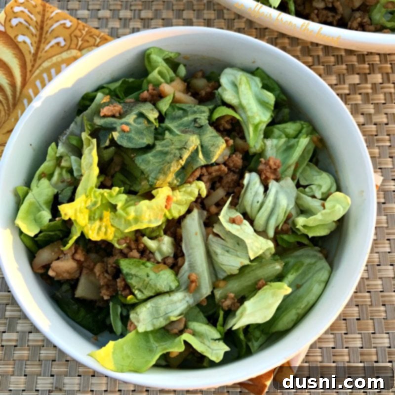 PF Changs Inspired Lettuce Wrap Salad 4 A fresh butter lettuce leaf, showcasing its crisp texture, ready to be used as a base for the lettuce wrap salad.